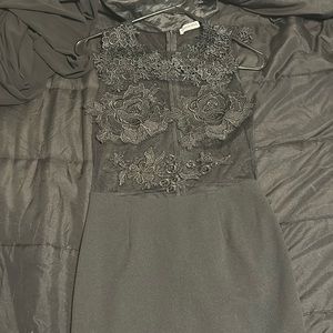 woman’s black dress